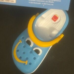 CROCS Kids Light Blue Smiley Clog with Yellow Strap